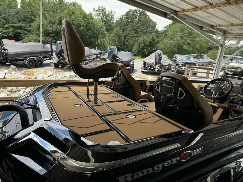 Slide: The Image of 2025 Ranger Z520R Cup-Equipped boat with sleek design and comfortable seating under a canopy. - 3