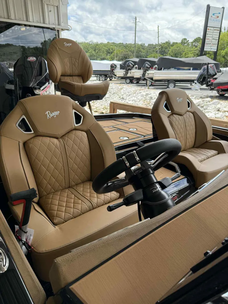Slide: The Image of 2025 Ranger Z520R Cup-Equipped boat with luxurious tan leather seats and steering wheel. - 7