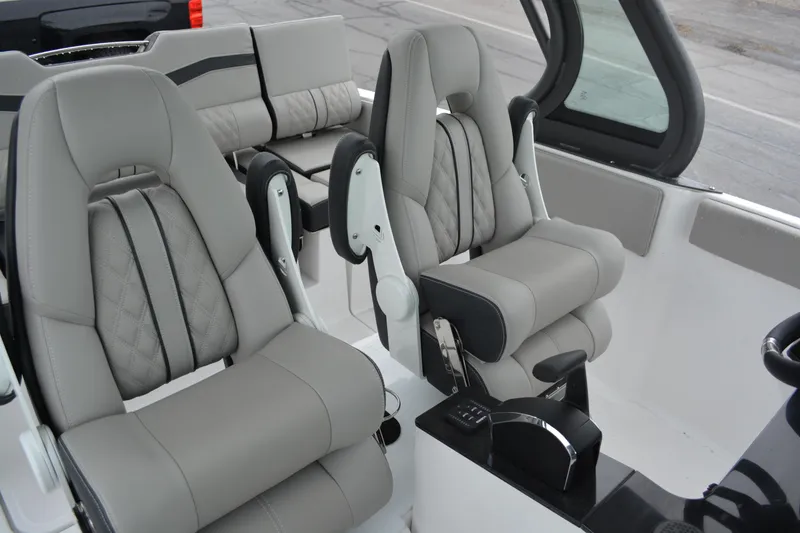Slide: The Image of Luxurious seating in 2026 Monterey Elite 25 SD boat interior, featuring modern design and comfort. - 10