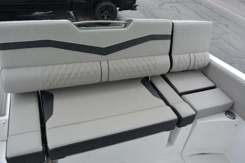 Slide: The Image of 2026 Monterey Elite 25 SD boat seating with modern design and quilted upholstery. - 8