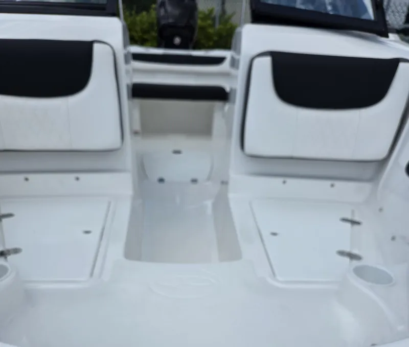 Slide: The Image of 2024 Tahoe 185 S boat interior with white and black seating. - 7