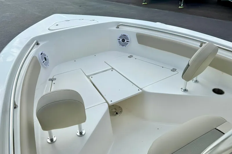 Slide: The Image of 2025 Key West 203 FS boat interior with seating and speakers. - 15