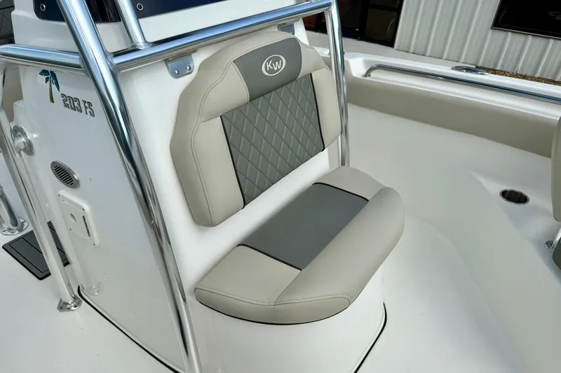 Slide: The Image of 2025 Key West 203 FS boat seat with gray and beige upholstery, featuring a sleek design. - 17