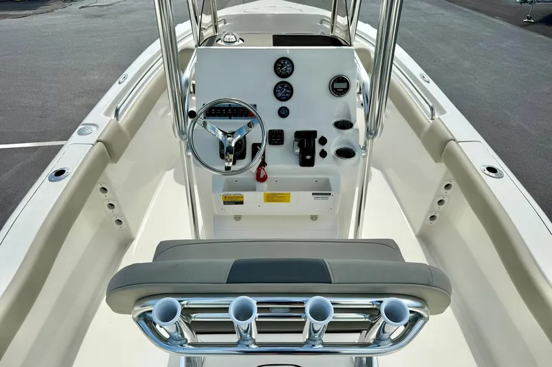 Slide: The Image of 2025 Key West 203 FS boat console with steering wheel and gauges. - 21