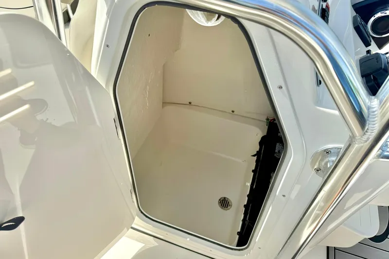 Slide: The Image of Open storage compartment on 2025 Key West 203 FS boat. - 23