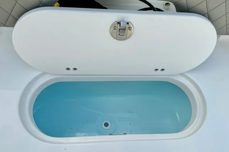 Slide: The Image of Open livewell on 2025 Key West 203 FS boat, showcasing interior water. - 27
