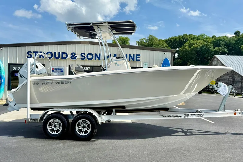 Slide: The Image of 2025 Key West 203 FS boat on trailer at Stroud & Son Marine dealership. - 6