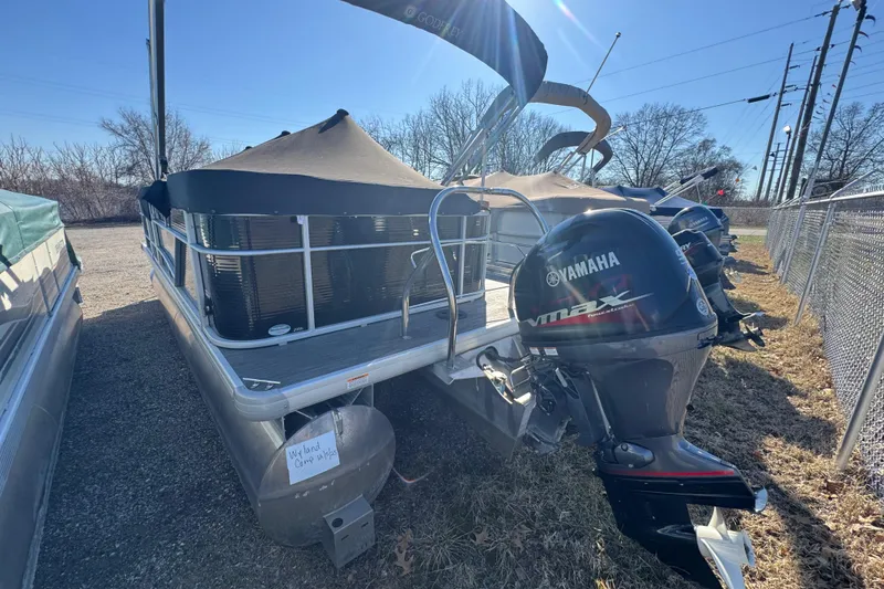 Slide: The Image of 2023 Sweetwater SW2086c pontoon boat with Yamaha VMAX outboard motor, parked outdoors. - 13