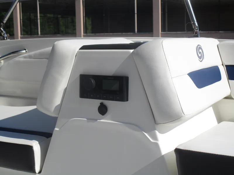 Slide: The Image of 2022 Hurricane SS 185 boat interior with white seating and audio controls. - 10