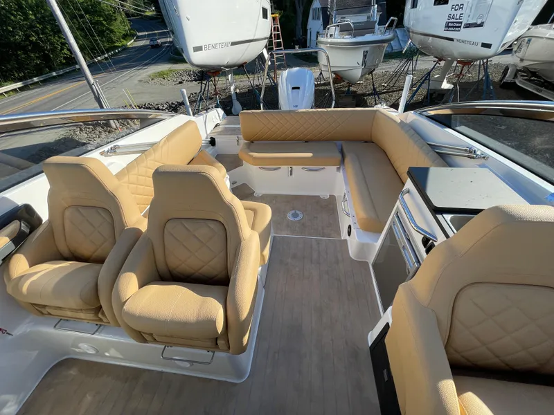 Slide: The Image of Luxurious interior of 2023 Yamarin 88 DC boat with beige seating and modern amenities. - 34