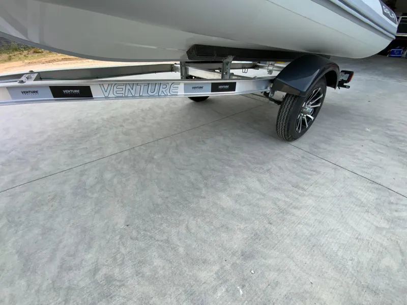 Slide: The Image of Trailer for 2026 Gala A330L boat on concrete surface. - 10