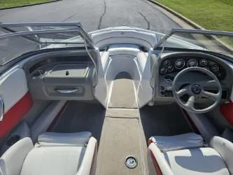 Slide: The Image of 2008 Crownline 19 SS boat interior with steering wheel and dashboard. - 8