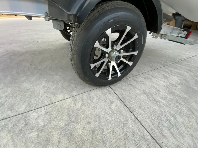 Slide: The Image of Close-up of a 2026 Gala A300 vehicle wheel on a concrete surface. - 10