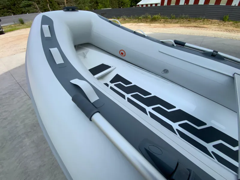 Slide: The Image of Inflatable boat Gala A300, 2026 model, on a concrete surface near trees and a building. - 5