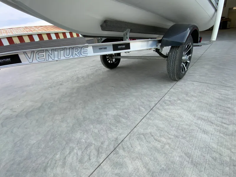 Slide: The Image of Trailer for Gala A300 boat, 2026 model, on concrete surface. - 9