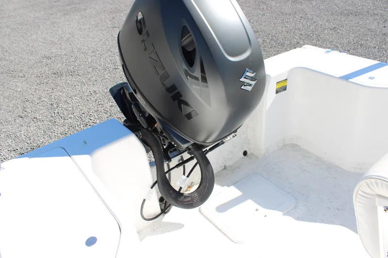 Slide: The Image of 2025 C-Hawk 19CC boat with Suzuki outboard motor, white interior, and clean deck. - 28