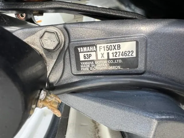 Slide: The Image of Yamaha F150XB engine label on 2023 Parker 21SE Center Console boat. - 9