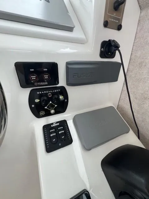 Slide: The Image of Control panel of 2021 Parker 2520 XLD Sport Cabin with Yamaha and Fusion systems. - 27