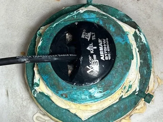 Slide: The Image of Airmar transducer installed on Parker 2520 XLD Sport Cabin, 2021 model, with visible cable connection. - 33