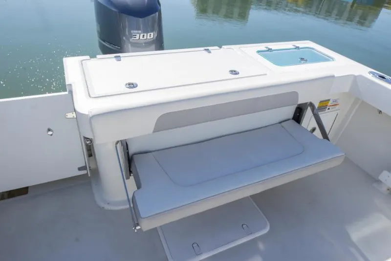 Slide: The Image of Manufacturer Provided Image: 2021 Parker 2520 XLD Sport Cabin boat with fold-down bench seat and Yamaha 300 outboard motor. - 5