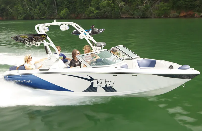 Slide: The Image of Manufacturer Provided Image: 2013 MasterCraft X-14V boat cruising on a lake with passengers. - 11
