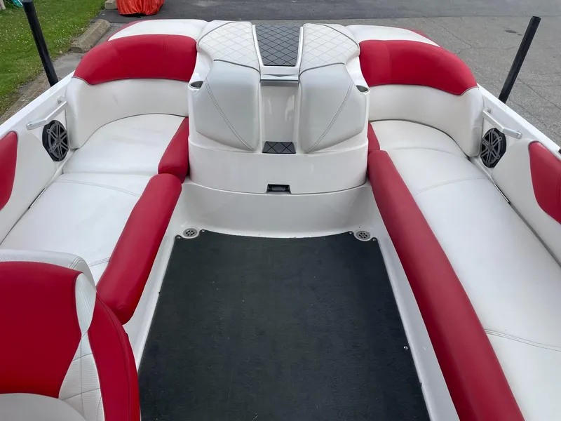 Slide: The Image of 2013 MasterCraft X-14V boat interior with red and white seating. - 5