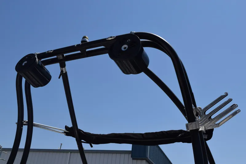 Slide: The Image of 2008 Centurion Elite V C4 Air Warrior wakeboard tower against clear blue sky. - 13