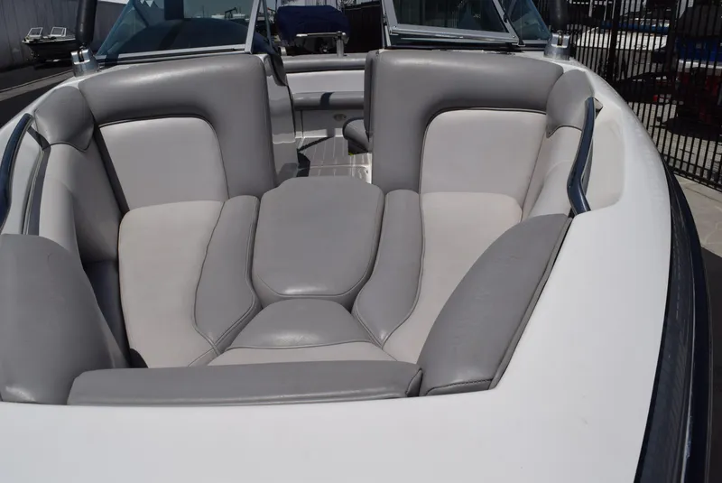 Slide: The Image of 2008 Centurion Elite V C4 Air Warrior boat with gray and white seating. - 8