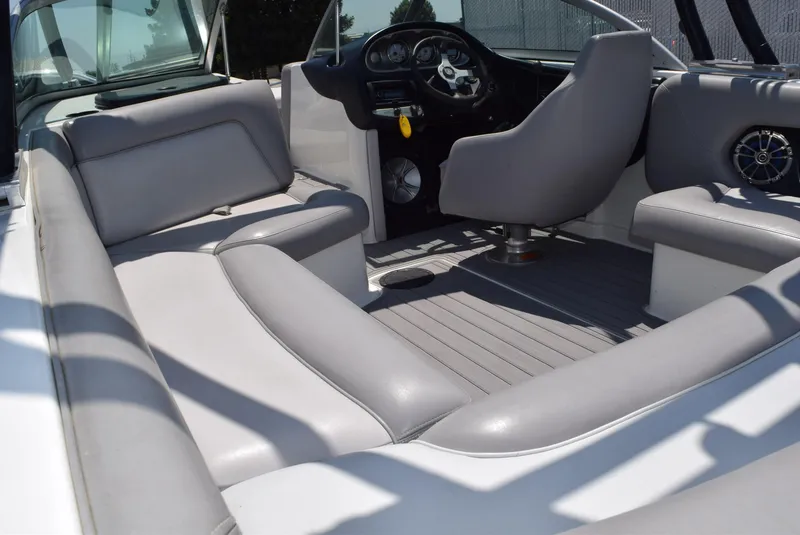 Slide: The Image of 2008 Centurion Elite V C4 Air Warrior boat interior with gray seating and steering console. - 9