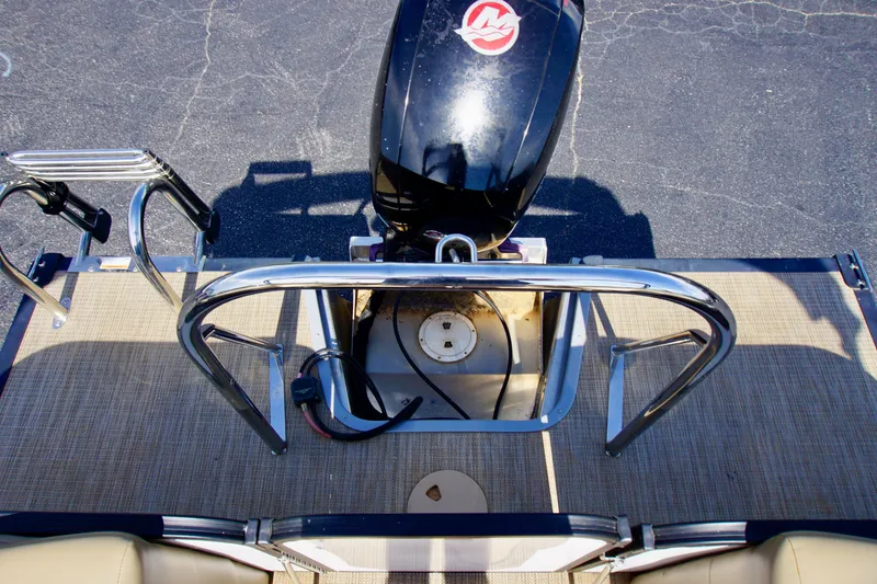 Slide: The Image of 2022 Manitou 23 Aurora LE RF boat engine and deck view. - 4