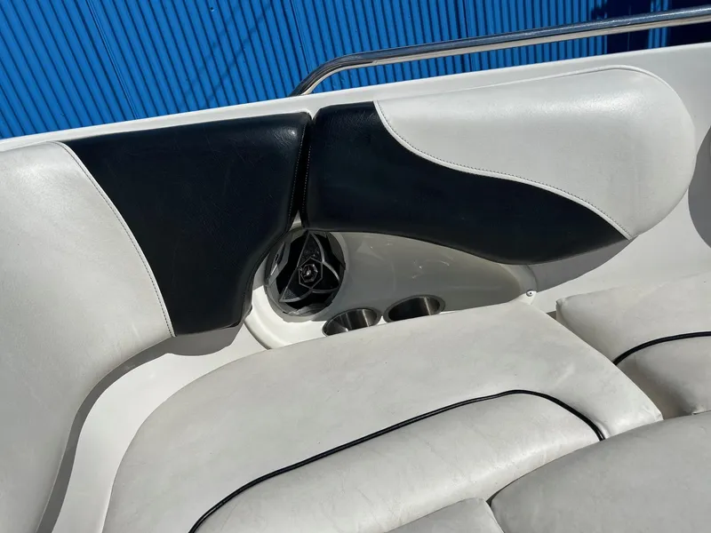 Slide: The Image of 2007 Reinell 220 LSE boat interior with white and black seating. - 19