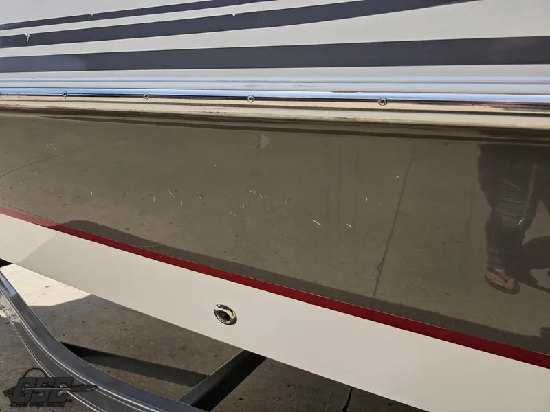 Slide: The Image of 2013 Hurricane SunDeck Sport 202 IO boat hull with minor scratches. - 22
