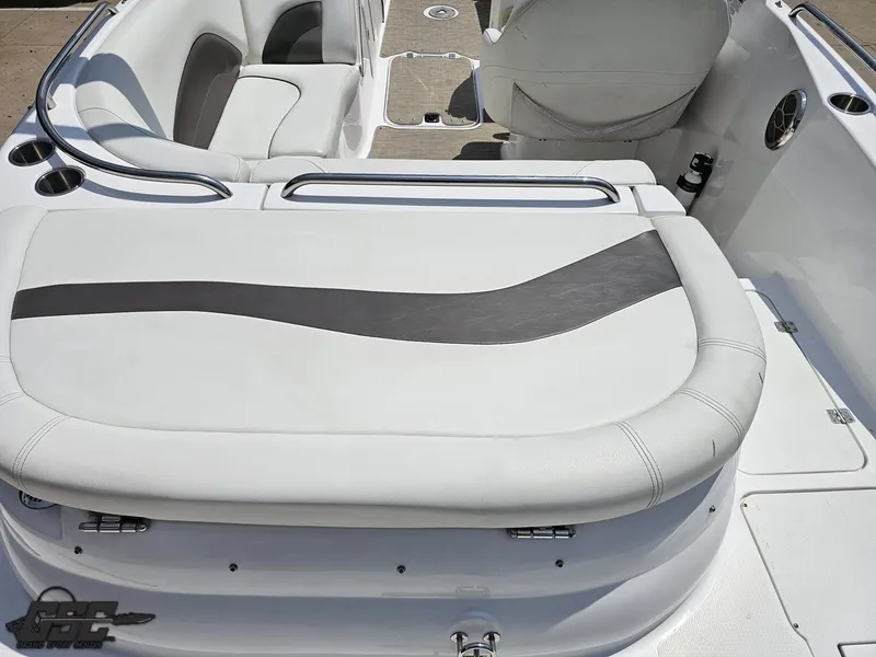 Slide: The Image of 2013 Hurricane SunDeck Sport 202 IO boat interior with white and gray seating. - 37