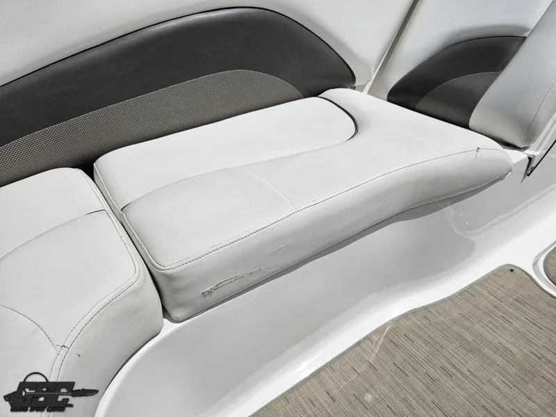 Slide: The Image of 2013 Hurricane SunDeck Sport 202 IO boat seating with white and black upholstery. - 46