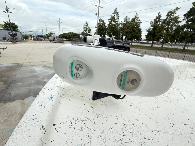 Slide: The Image of Blazer Bay 2400 boat with iPilot system, parked outdoors, 2015 model. - 13