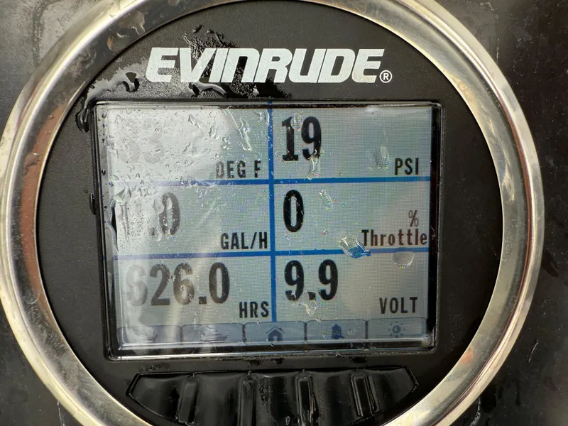 Slide: The Image of Evinrude boat gauge displaying temperature, throttle, hours, and voltage readings, Blazer Bay 2400, 2015. - 20