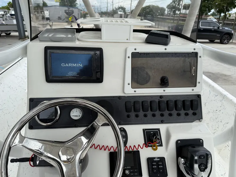 Slide: The Image of Control panel of a 2015 Blazer Bay 2400 boat with Garmin navigation system. - 21