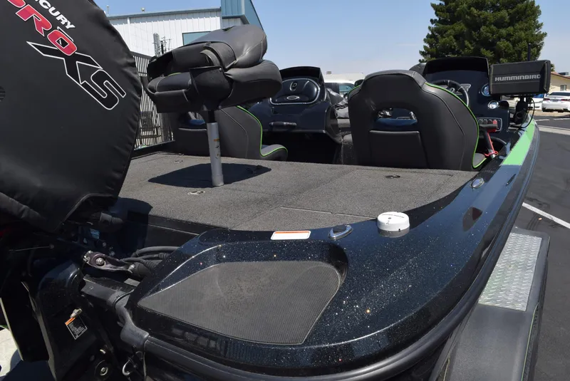 Slide: The Image of 2018 Nitro Z18 boat interior with seating and control panel, featuring a Mercury Pro XS engine cover. - 4