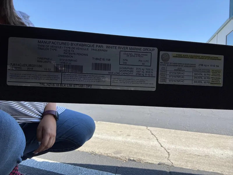 Slide: The Image of 2018 Nitro Z18 trailer label with specifications and tire information. - 7