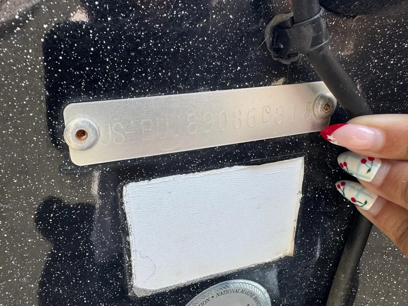Slide: The Image of Close-up of a Nitro Z18 2018 model's identification plate with decorative nails. - 8