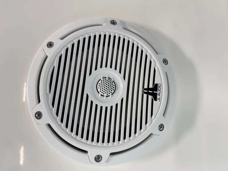 Slide: The Image of White JL Audio speaker on 2021 Boston Whaler 270 Dauntless boat. - 22