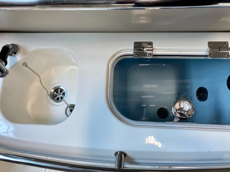 Slide: The Image of Boston Whaler 270 Dauntless 2021 boat sink and livewell detail. - 5