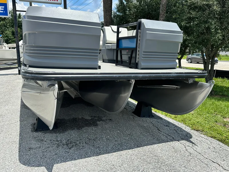 Slide: The Image of 2026 Sylvan A22 LZ Sport pontoon boat on display, showcasing sleek design and modern features. - 2