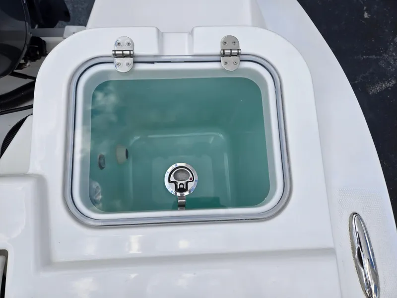 Slide: The Image of Livewell on 2023 NauticStar 242L Offshore boat, open lid view. - 7
