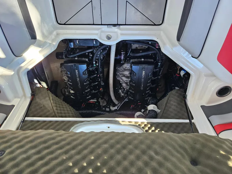Slide: The Image of 2020 Yamaha Boats 242X engine compartment with twin engines. - 22