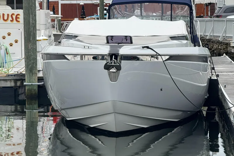 Slide: The Image of 2021 Fairline F//Line 33 yacht docked at marina, front view. - 0