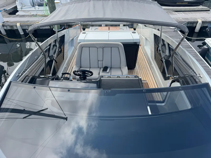 Slide: The Image of 2021 Fairline F//Line 33 yacht with sleek design and modern cockpit. - 3