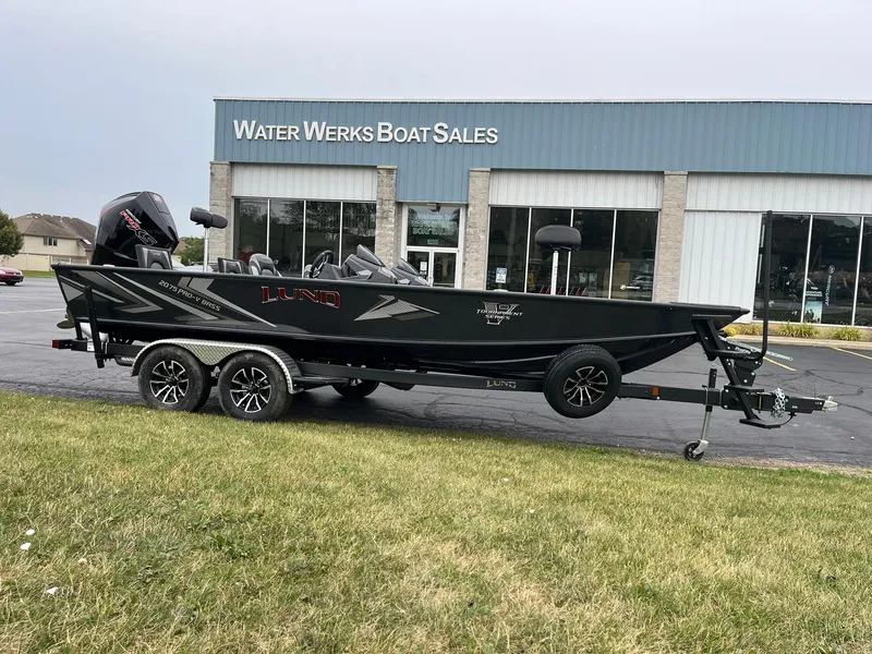 Slide: The Image of 2026 Lund 2075 Pro-V Bass XS boat on trailer at Water Werks Boat Sales. - 1