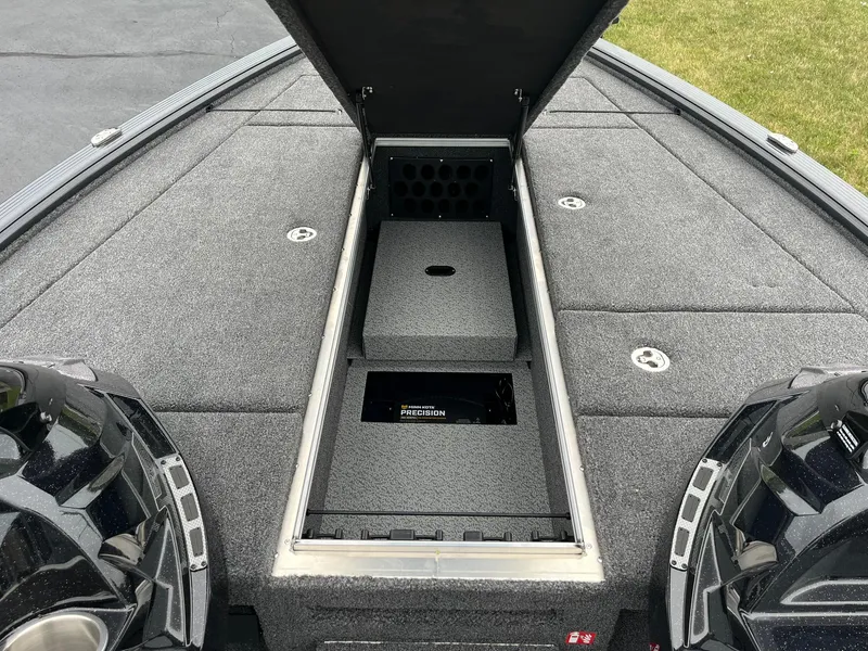 Slide: The Image of 2026 Lund 2075 Pro-V Bass XS boat with open storage compartment on deck. - 10