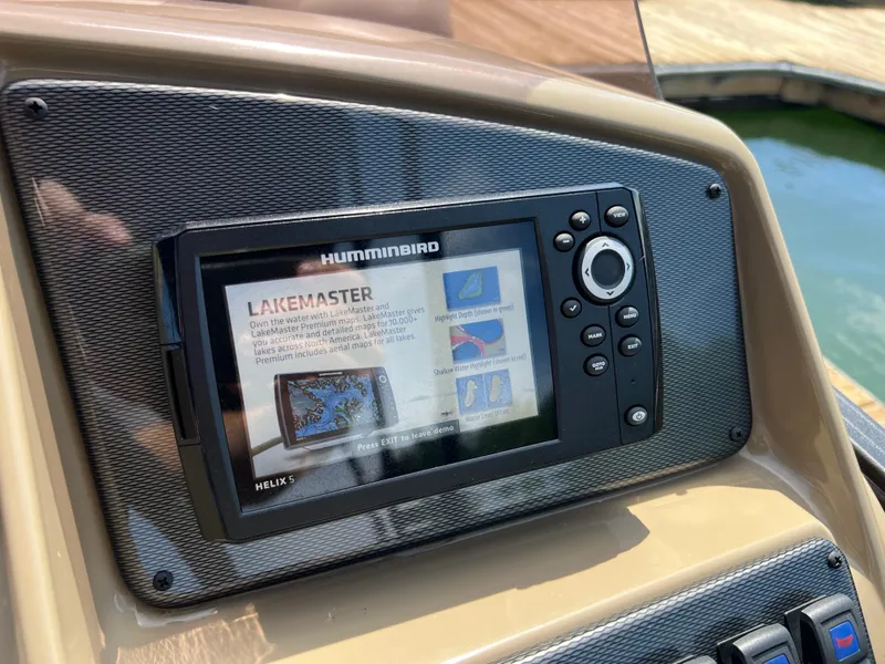 Slide: The Image of Humminbird Helix 5 fish finder on Starcraft EXS 3 boat, 2025 model, displaying Lakemaster map. - 12